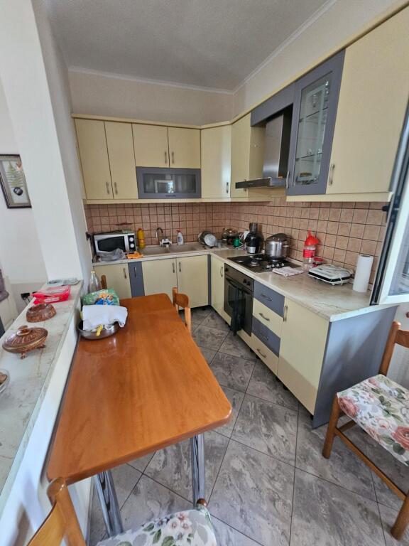 HOUSE BUILDING + BUSINESS PREMISES NEAR THE STADIUM