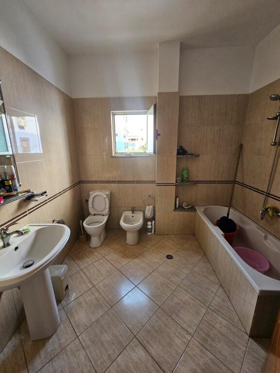 HOUSE BUILDING + BUSINESS PREMISES NEAR THE STADIUM
