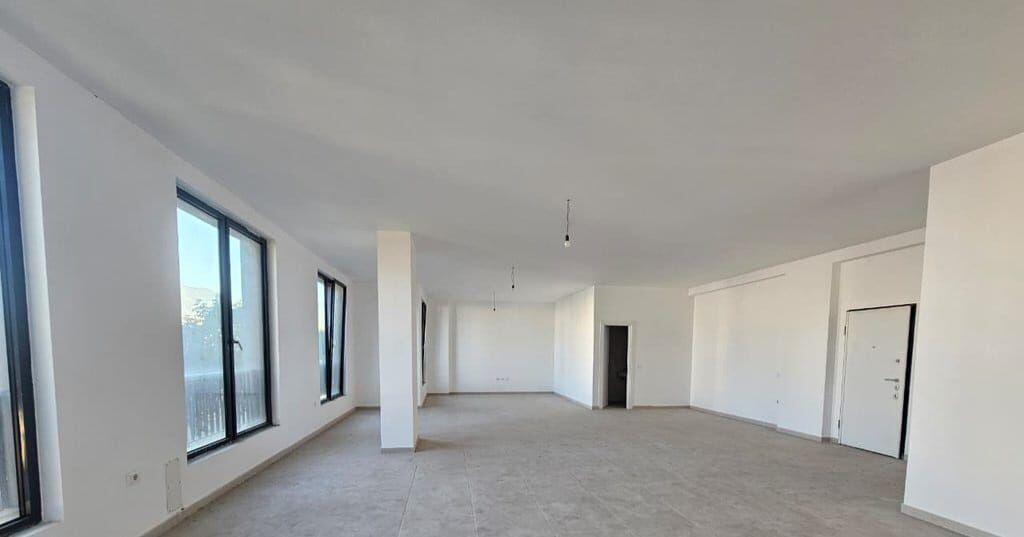 LOCALE COMMERCIALE IN AFFITTO PRESSO LA RESIDENZA ZIRKON CON VISIBILITÀ DALLA STRADA PRINCIPALE