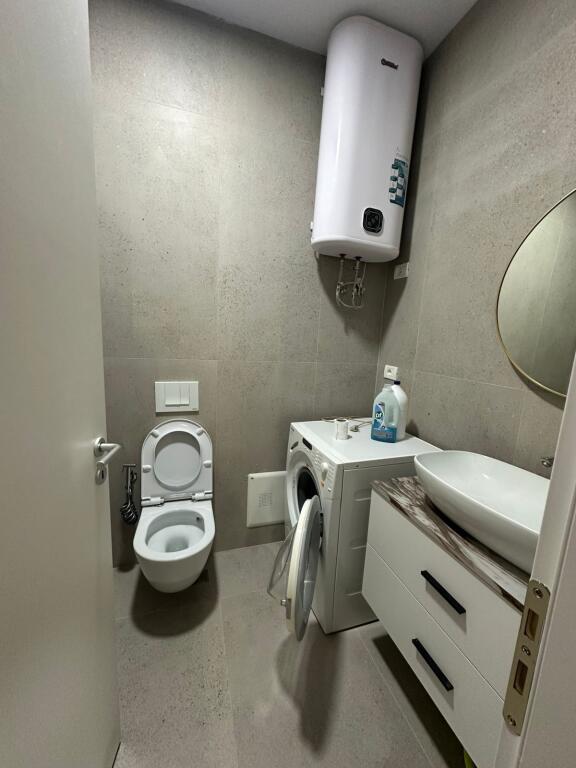 1+1,luxury furnished,near the red school.price 650 thousand lek