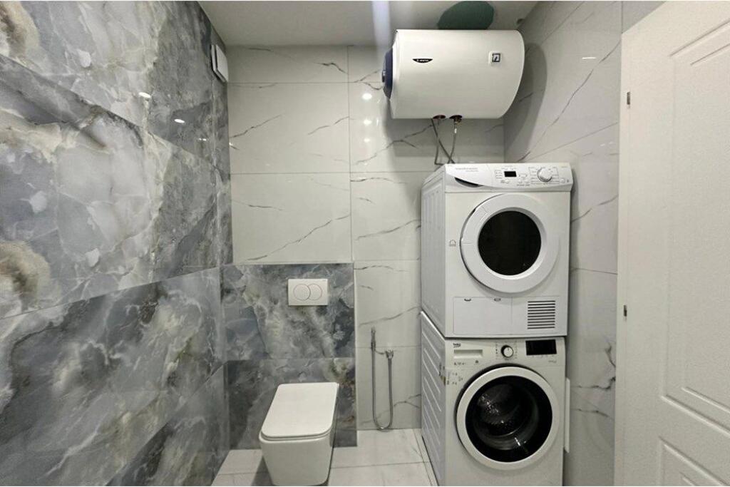 APPARTAMENTO 2+1+2 CON POSTO AUTO