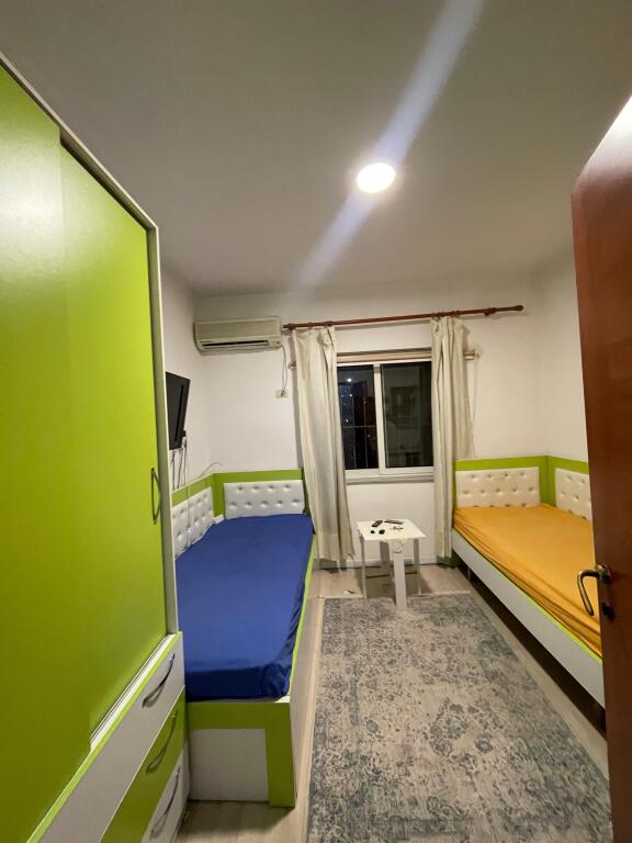 Apartment 2+1 for sale with mortgage behind the building with arrows