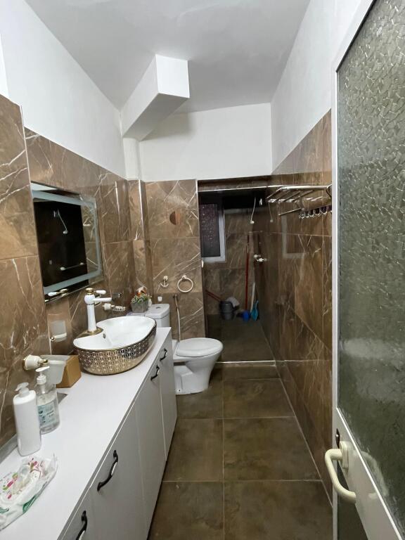 Apartment 2+1 for sale with mortgage behind the building with arrows