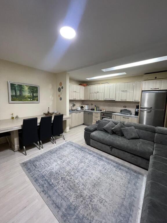 Apartment 2+1 for sale with mortgage behind the building with arrows