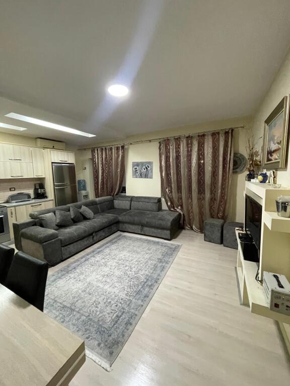Apartment 2+1 for sale with mortgage behind the building with arrows