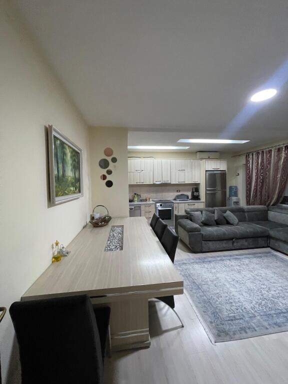 Apartment 2+1 for sale with mortgage behind the building with arrows