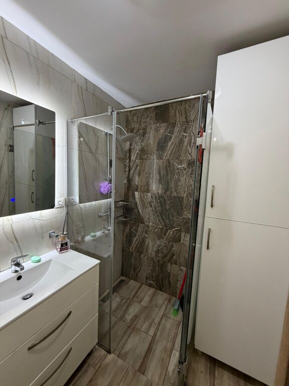 • Apartment for rent near the Zoo Garden, Tirana  • 2nd floor  • 2 bedrooms  • Living room + kitchen  • 2 bathrooms  • Closed balcony  • Heating system  • Elevator  • Parking possibility  • 3 minutes (800 m) from the Lake  • Price: 720 €/month