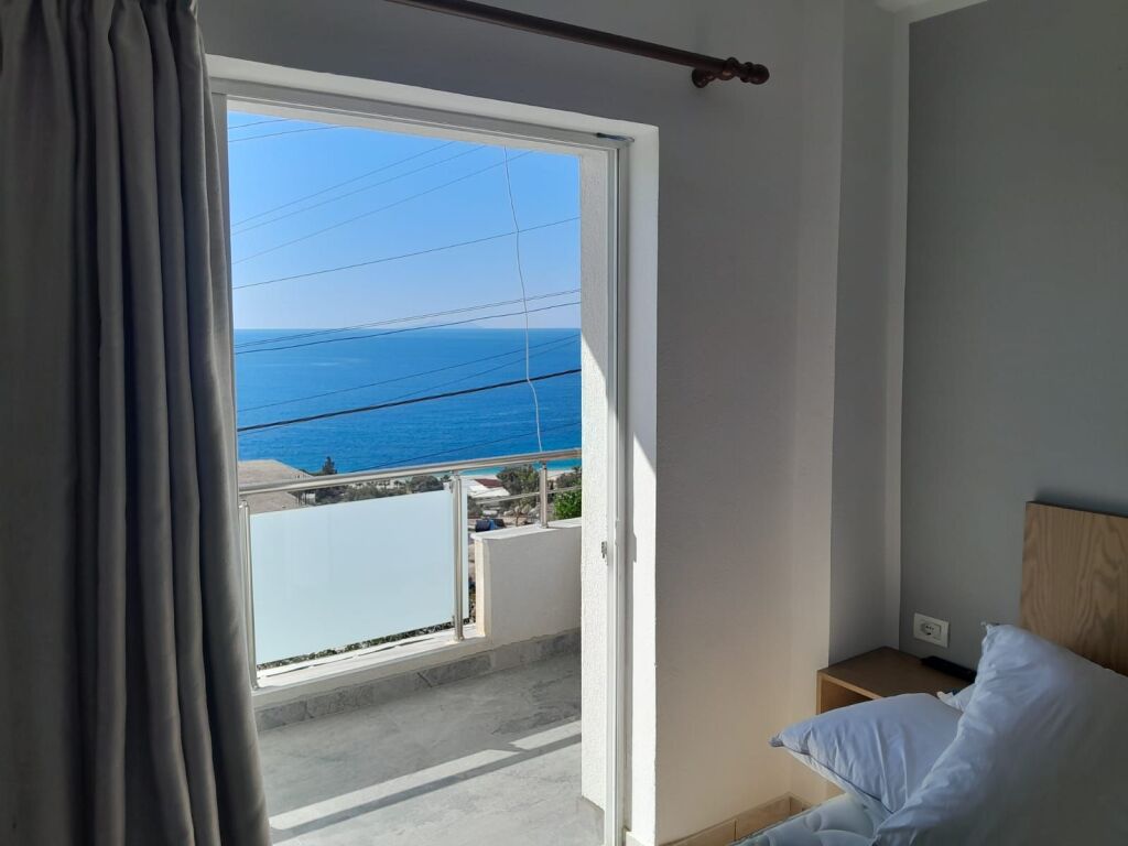 Three-story building for sale very close to the sea