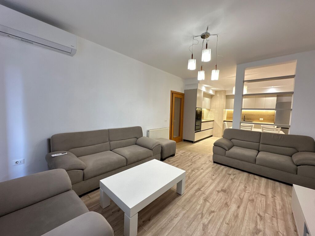Ofrojme Apartament 2+1 per Qira ne zonen e Komunes se Parisit, tek Kika 1. Pocionohet ne katin e 5 banim, rezidenca eshte e mireoganizuar dhe me sherbimet e nevojshme perreth. Apartamenti eshte i tipologjise 2+1. ne hapesira te mireorganizuara ne nje sallon ndenjeje me dalje ne ballkon, kuzhina e ndare me vete, 2 dhoma gjumi dhe 2 tualete. Ne prone jane bere investime te reja nga pronari, kuzhina, mobilimi si dhe nderhyrjet elektrike dhe hisdrosanitare. Apartamenti ofrohet i mobiluar.  Parkim ospional ne kosto shtese.  Per detaje shtese apo vizite ne prone mos hezitoni te na kontaktoni!