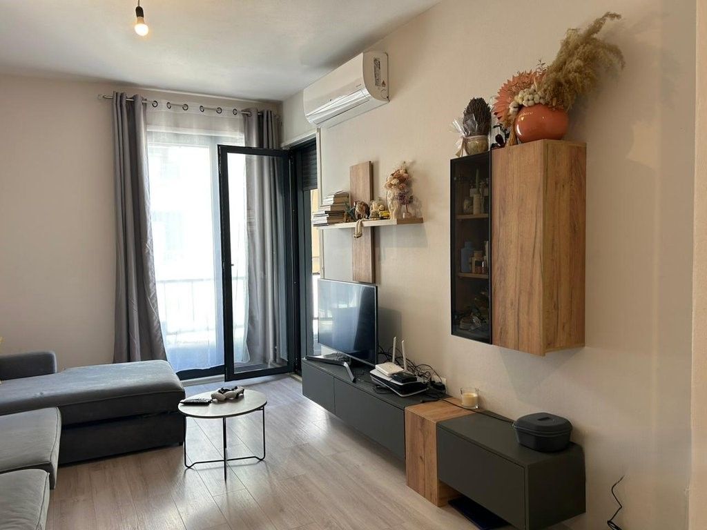 Apartment 1+1 + parking space for sale in the Kinostudios area!
