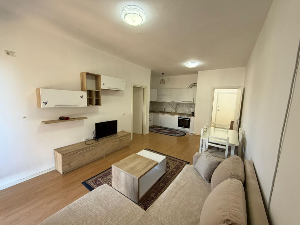 Apartment 1+1 for rent at 5 Maji  The apartment is located in a new building, with modern conditions and high construction quality.  * Area: 70 m² * Floor: 2 * Layout: 1 bedroom + living room with kitchen * Furnishing: completely new, never lived in before  💰 Price: 55,000 lek/month