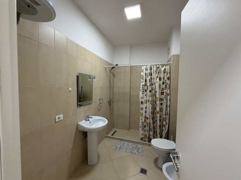 Apartment 1+1 for rent at 5 Maji  The apartment is located in a new building, with modern conditions and high construction quality.  * Area: 70 m² * Floor: 2 * Layout: 1 bedroom + living room with kitchen * Furnishing: completely new, never lived in before  💰 Price: 55,000 lek/month