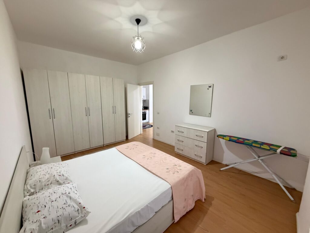 Apartment 1+1 for rent at 5 Maji  The apartment is located in a new building, with modern conditions and high construction quality.  * Area: 70 m² * Floor: 2 * Layout: 1 bedroom + living room with kitchen * Furnishing: completely new, never lived in before  💰 Price: 55,000 lek/month