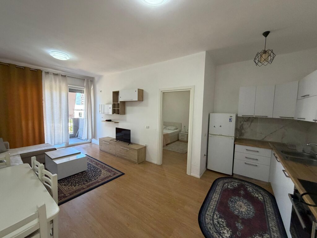 Apartment 1+1 for rent at 5 Maji  The apartment is located in a new building, with modern conditions and high construction quality.  * Area: 70 m² * Floor: 2 * Layout: 1 bedroom + living room with kitchen * Furnishing: completely new, never lived in before  💰 Price: 55,000 lek/month