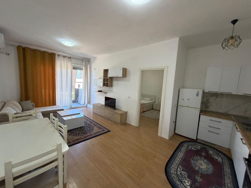 Apartment 1+1 for rent at 5 Maji  The apartment is located in a new building, with modern conditions and high construction quality.  * Area: 70 m² * Floor: 2 * Layout: 1 bedroom + living room with kitchen * Furnishing: completely new, never lived in before  💰 Price: 55,000 lek/month