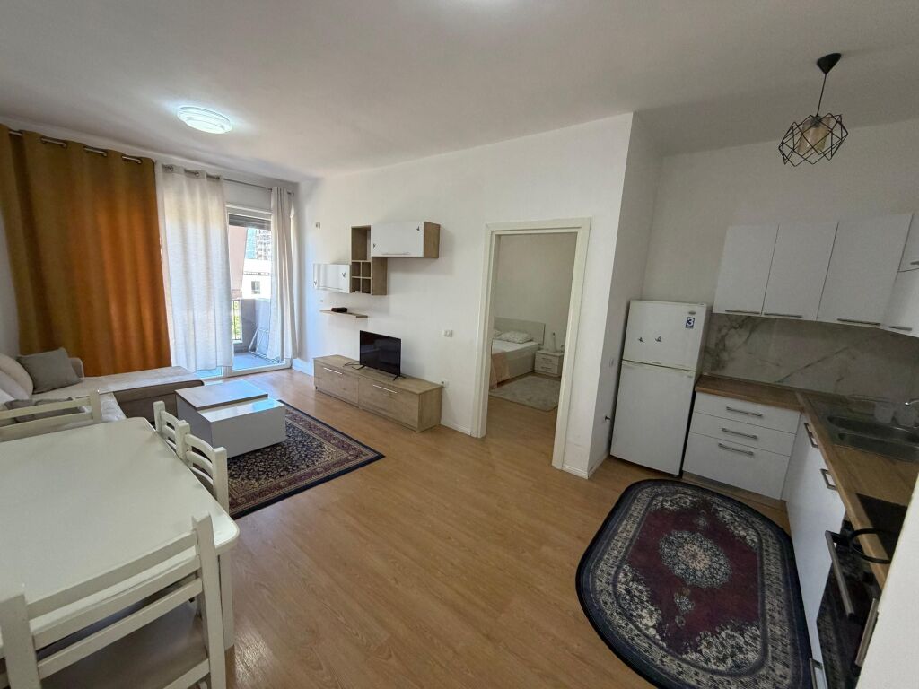 Apartment 1+1 for rent at 5 Maji  The apartment is located in a new building, with modern conditions and high construction quality.  * Area: 70 m² * Floor: 2 * Layout: 1 bedroom + living room with kitchen * Furnishing: completely new, never lived in before  💰 Price: 55,000 lek/month