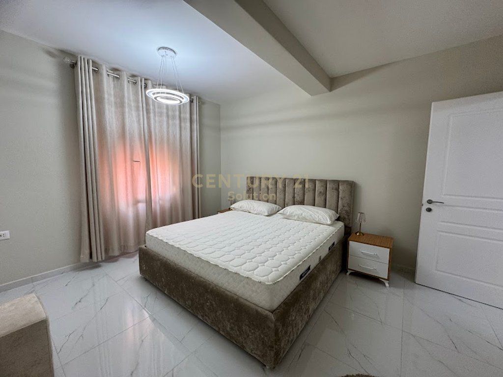 Apartment 2+1 for rent in the Golden Tower residence, on Mine Peza Street. The apartment is located on the 7th floor and offers a functional layout with spacious rooms and natural lighting. The property has a total area of 105 m² (87 m² net) and has never been inhabited before, offering completely new living conditions. The residence is modern, with management and high construction standards, in one of the most sought-after areas of Tirana. Price: 1,300 €/month For more information or a property visit, contact.