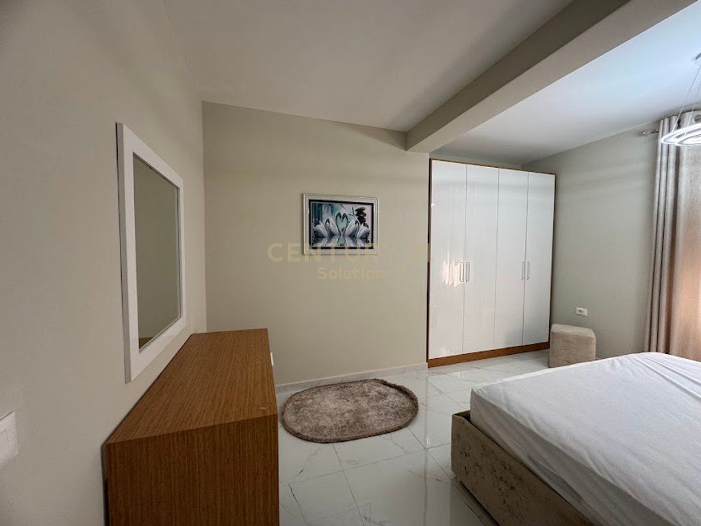 Apartment 2+1 for rent in the Golden Tower residence, on Mine Peza Street. The apartment is located on the 7th floor and offers a functional layout with spacious rooms and natural lighting. The property has a total area of 105 m² (87 m² net) and has never been inhabited before, offering completely new living conditions. The residence is modern, with management and high construction standards, in one of the most sought-after areas of Tirana. Price: 1,300 €/month For more information or a property visit, contact.
