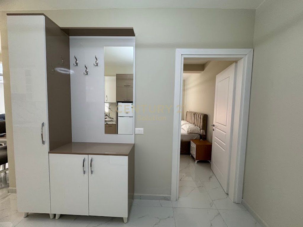 Apartment 2+1 for rent in the Golden Tower residence, on Mine Peza Street. The apartment is located on the 7th floor and offers a functional layout with spacious rooms and natural lighting. The property has a total area of 105 m² (87 m² net) and has never been inhabited before, offering completely new living conditions. The residence is modern, with management and high construction standards, in one of the most sought-after areas of Tirana. Price: 1,300 €/month For more information or a property visit, contact.