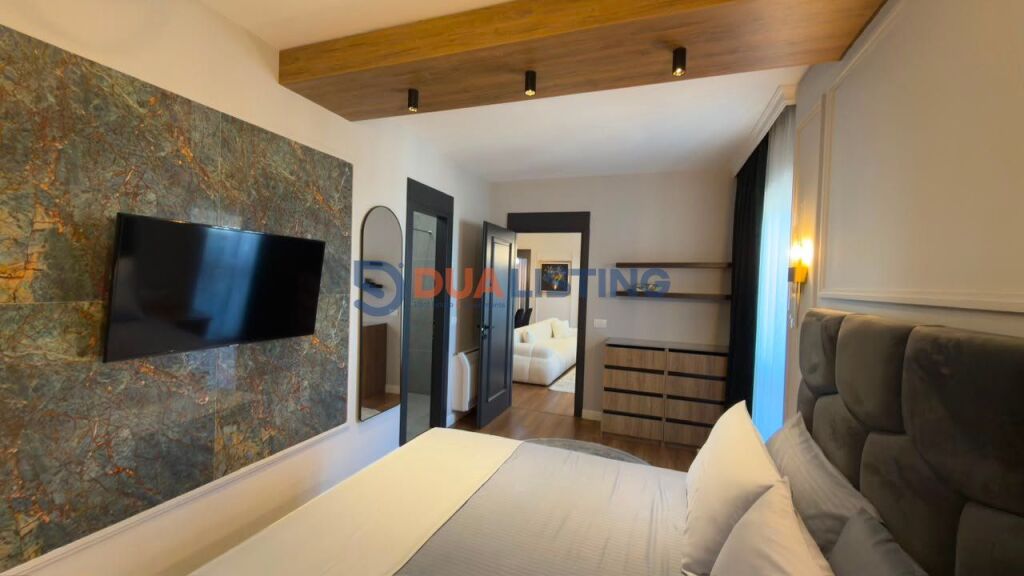 Affittasi appartamento 3+1+2 con posto auto presso Garden Building !!