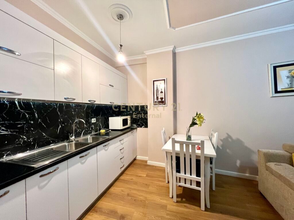 Apartment 1 +1 for rent near Partizani High School .