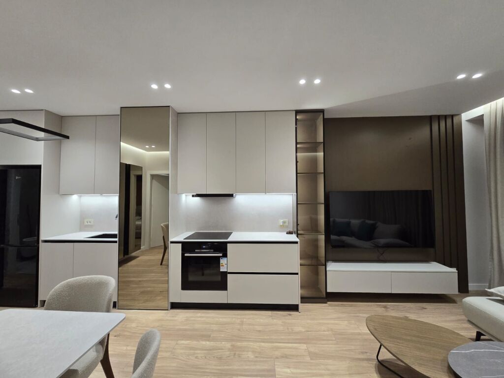 In the Center of Tirana, a modern 2+1 apartment with parking space is for rent. 