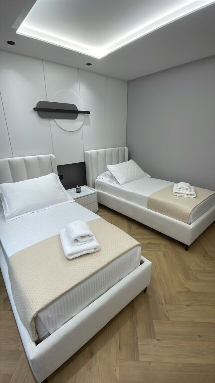 Apartment 2+1+2 for rent is given at Dinamo Stadium, Willson Square, former Block, Andon Zako Cajupi Street.
