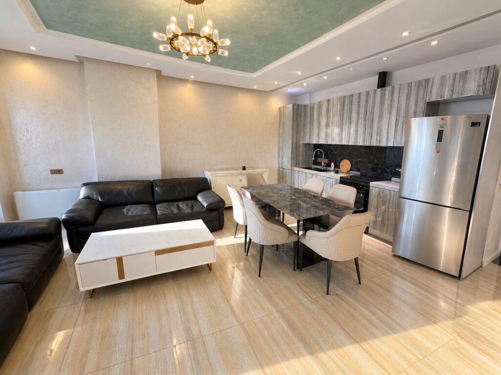 # IN AFFITTO: 1+1 + Garage 📍Fusha e Aviacionit (Turdiu Residence) – 70.000 Lekë/Mese || 11° Piano – Vista Libera ✨️ || Edificio del 2024 – 110 m² || Arredamento Moderno