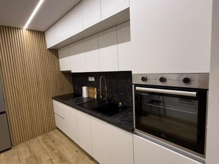 Apartament 1+1, 21 Dhjetori!
