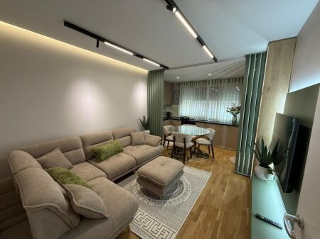  SUPER RENT Apartment 1+1 with Balcony  Zoological Garden, Tirana     New Building  🪜 1st Floor (With Elevator)   Furnished by Architect   Never Lived In Before    Price 850 Euro