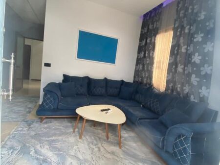 Apartment for rent in a private house – near the school “Sarina 2002” (at Treshi), Tirana.  Typology: 3+1   Floor: first  The apartment is fully furnished and equipped with modern household appliances, with energy class A++ / A+++.   Each room equipped with air conditioning   Spacious and functional environment   Suitable for families or long-term stay   The premises are monitored with security cameras from outside   Spacious yard with automatic gate, parking for 1–2 cars   Price: 450 € / month   Parking included