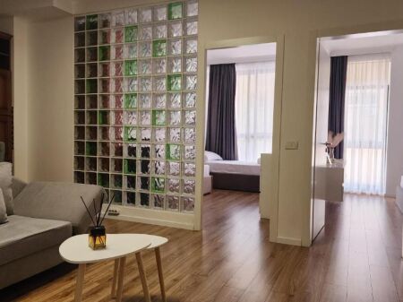 Kavaja Street - For Rent 2+1 Modern Behind Garden Building With Elevator The apartment has an area of 75m2 and is located on the 2nd floor of a new and very well-managed building The apartment is furnished with the best conditions for modern living and having the perfect location it is organized into two bedrooms and a large balcony and a new bathroom PRICE IN LEKE 75,000 ALL