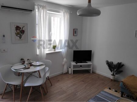 Apartment 1+1 for sale near the new Maternity.